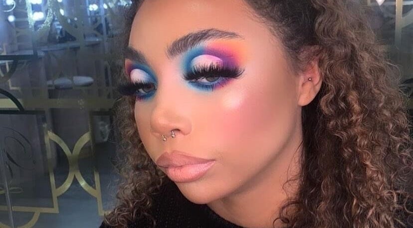 Colorful makeup artistry at Beauty Chaos, Bangor, Wales, GB, showcasing bold eye and lip look.