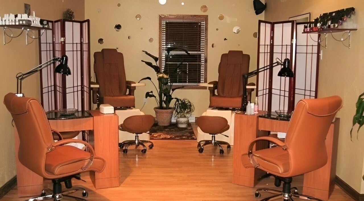 Elegant nail care area at Spa-Tacular in Lower Burrell, Pennsylvania, US with comfortable seating and decor.