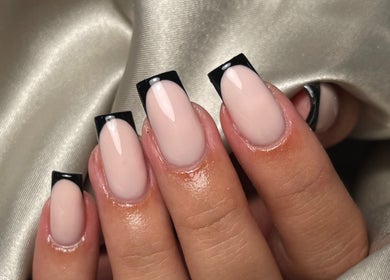 Stylish black tip manicure at Sculpt Nails & Aesthetics, Warrington, England, GB, showcasing modern elegance.