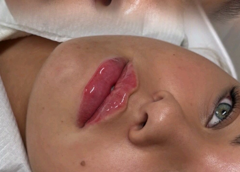 Close-up of glossy lips at Sculpt Nails & Aesthetics, Warrington, England, GB, highlighting beauty treatment.