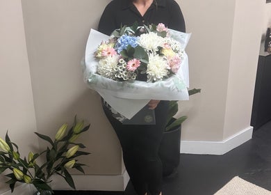 Bouquet display at The Pretty Parlour, Gloucester, England, GB, enhancing the serene ambiance.