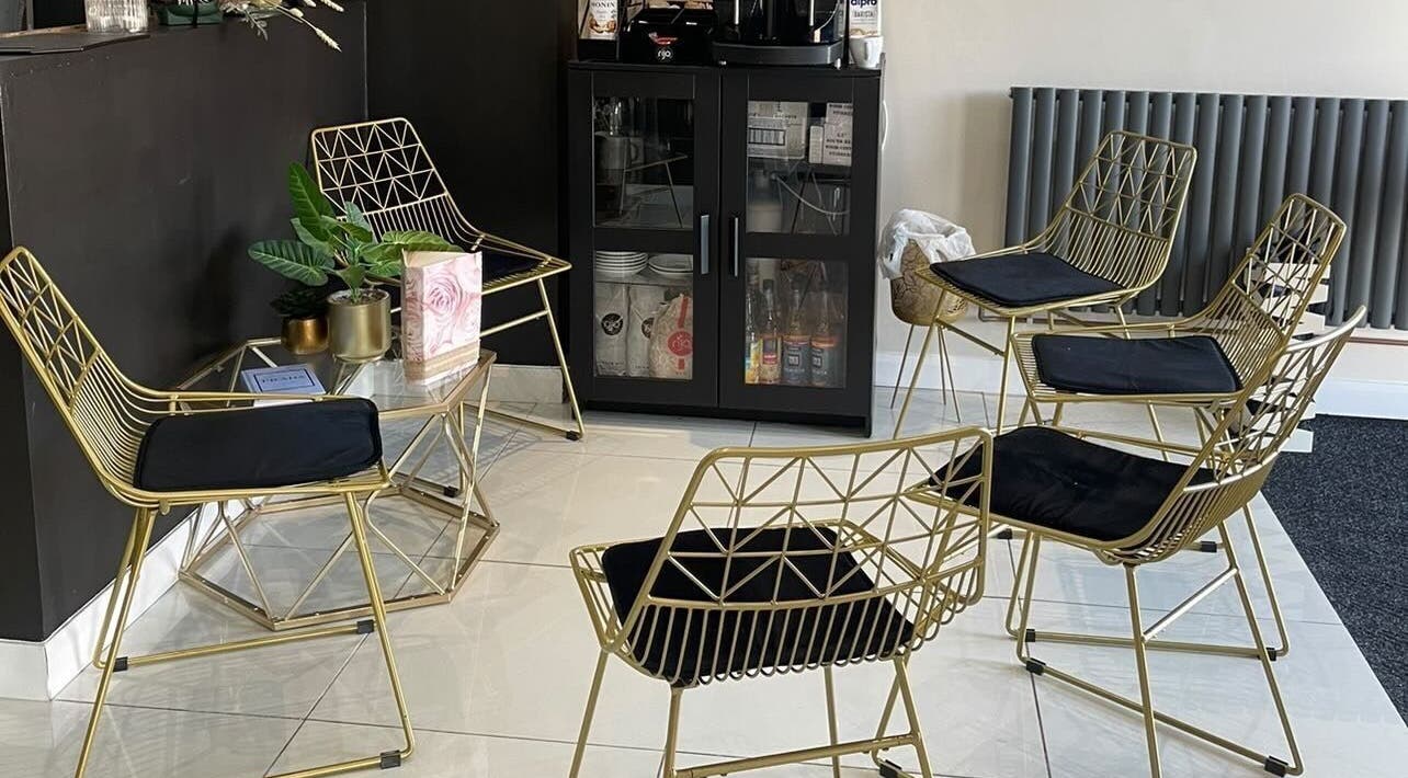 Elegant waiting area in The Mix Up, Cannock, England, GB with stylish chairs and modern decor.