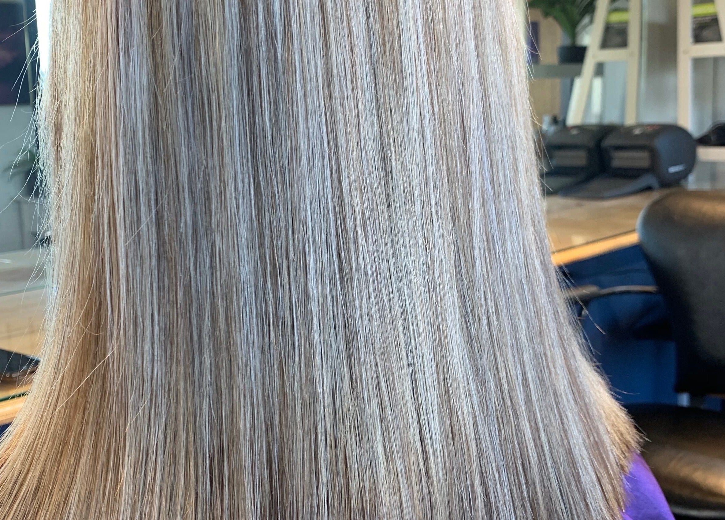 Sleek blonde hair styled at Casey’s Hair Studio, Melbourne, Victoria, AU.