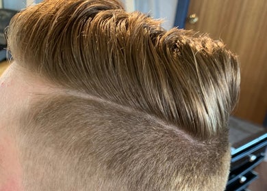 Close-up of a stylish undercut hairstyle at Casey’s Hair Studio in Melbourne, Victoria, AU.