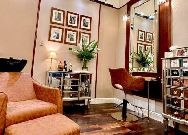 Elegant salon interior at David Sebastian, Derby, England, GB, featuring cozy chairs and stylish decor.