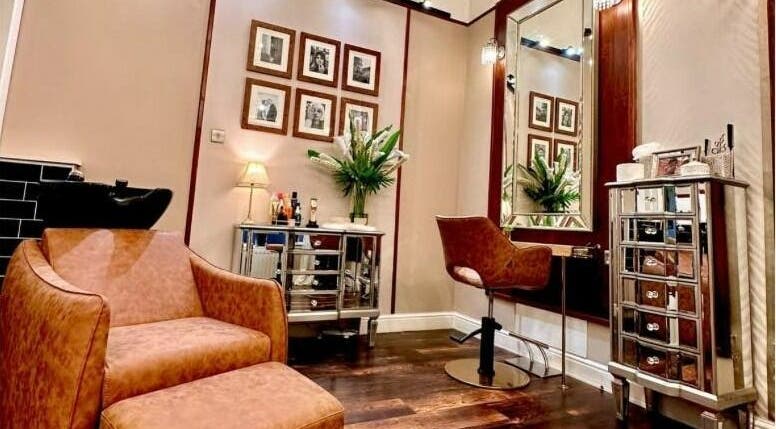 Elegant salon interior at David Sebastian, Derby, England, GB, featuring cozy chairs and stylish decor.
