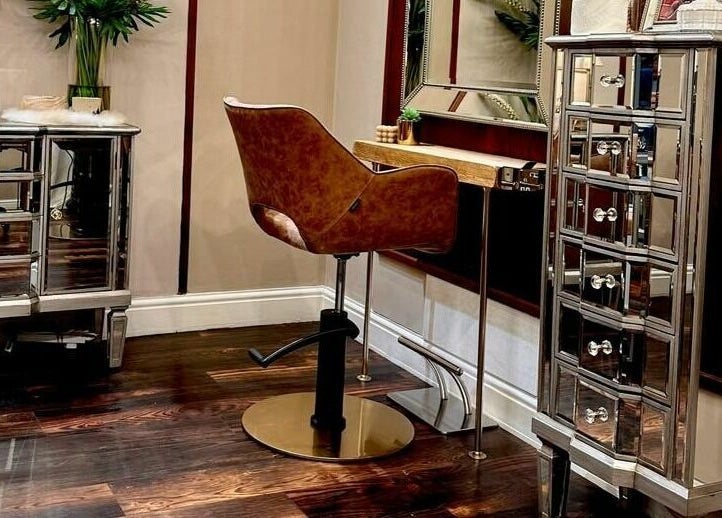 Elegant salon chair at David Sebastian, Derby, England, GB, highlights luxury beauty service ambiance.