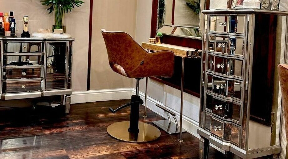Elegant salon chair at David Sebastian, Derby, England, GB, highlights luxury beauty service ambiance.