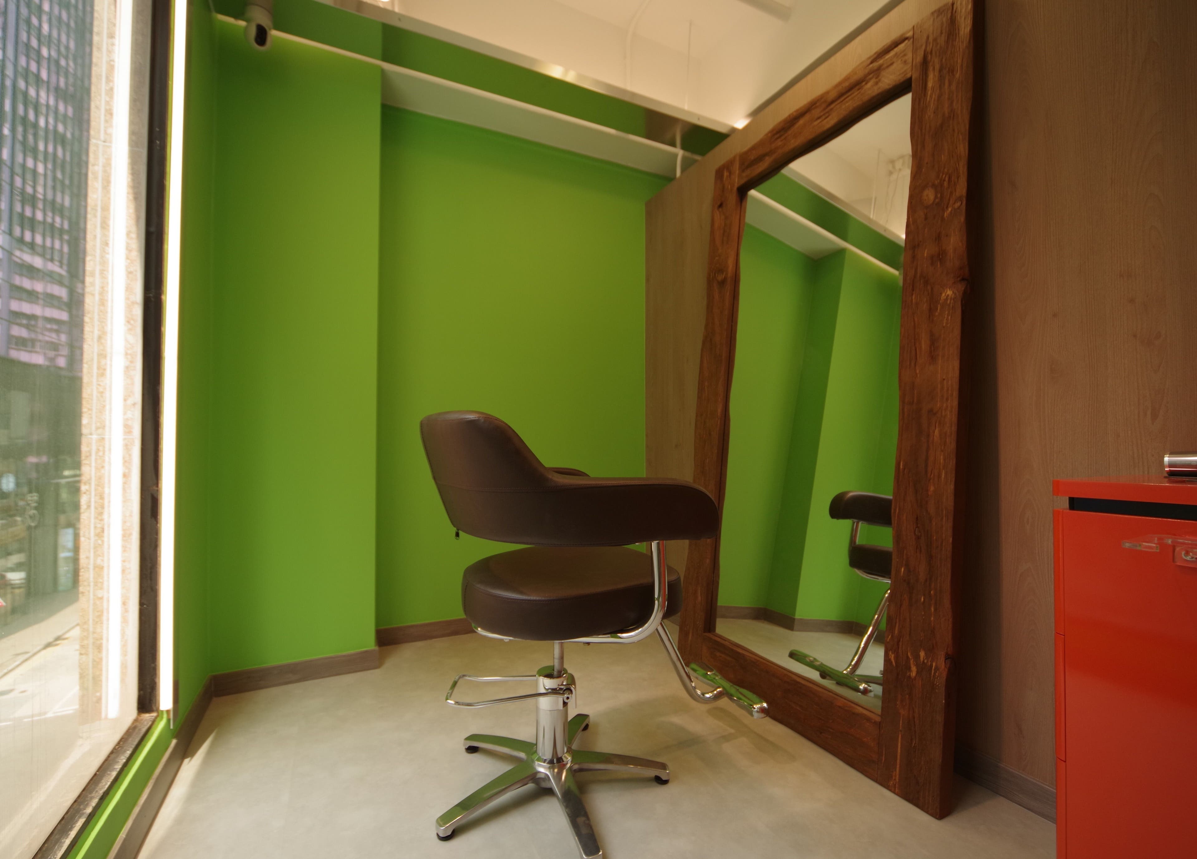 Elegant salon chair and mirror at Causeway Bay Branch, Hong Kong Island, Hong Kong Island, HK.