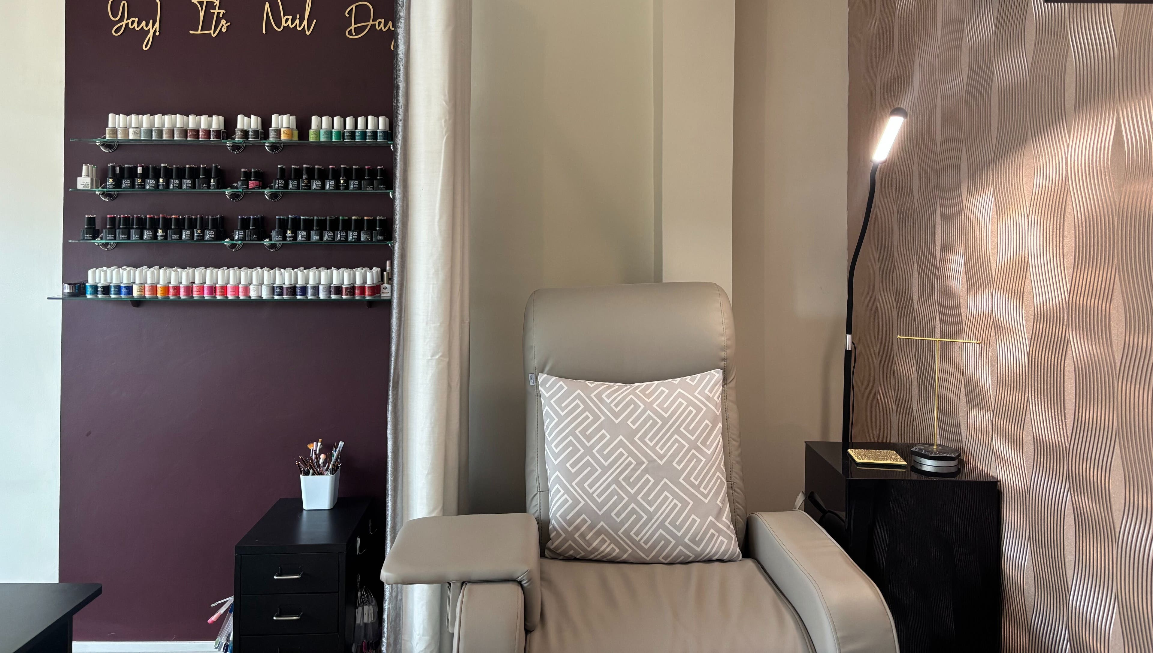 Luxurious nail lounge at Beauty Within, Gosport, England. Elegant design with vibrant polish collection.
