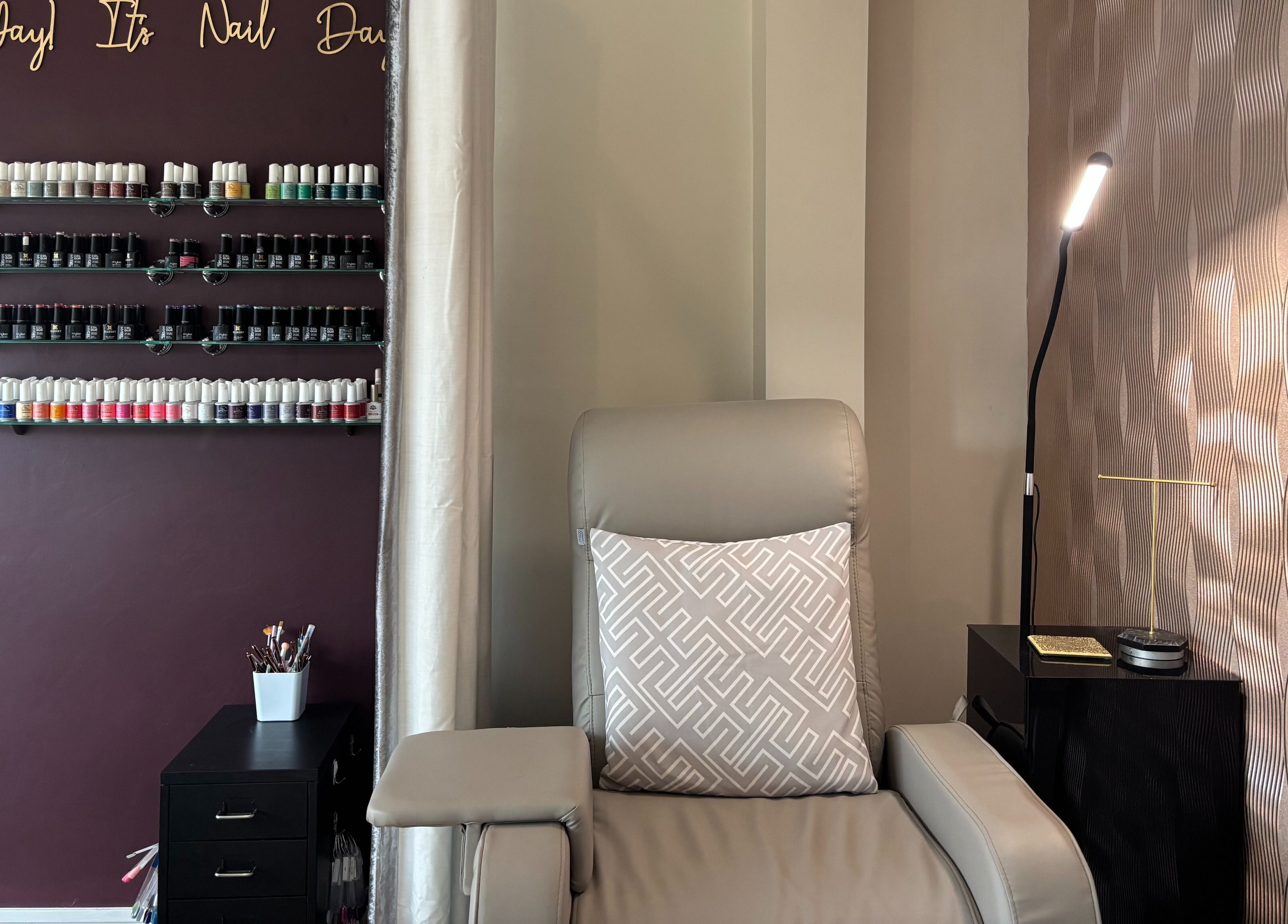 Luxurious nail lounge at Beauty Within, Gosport, England. Elegant design with vibrant polish collection.