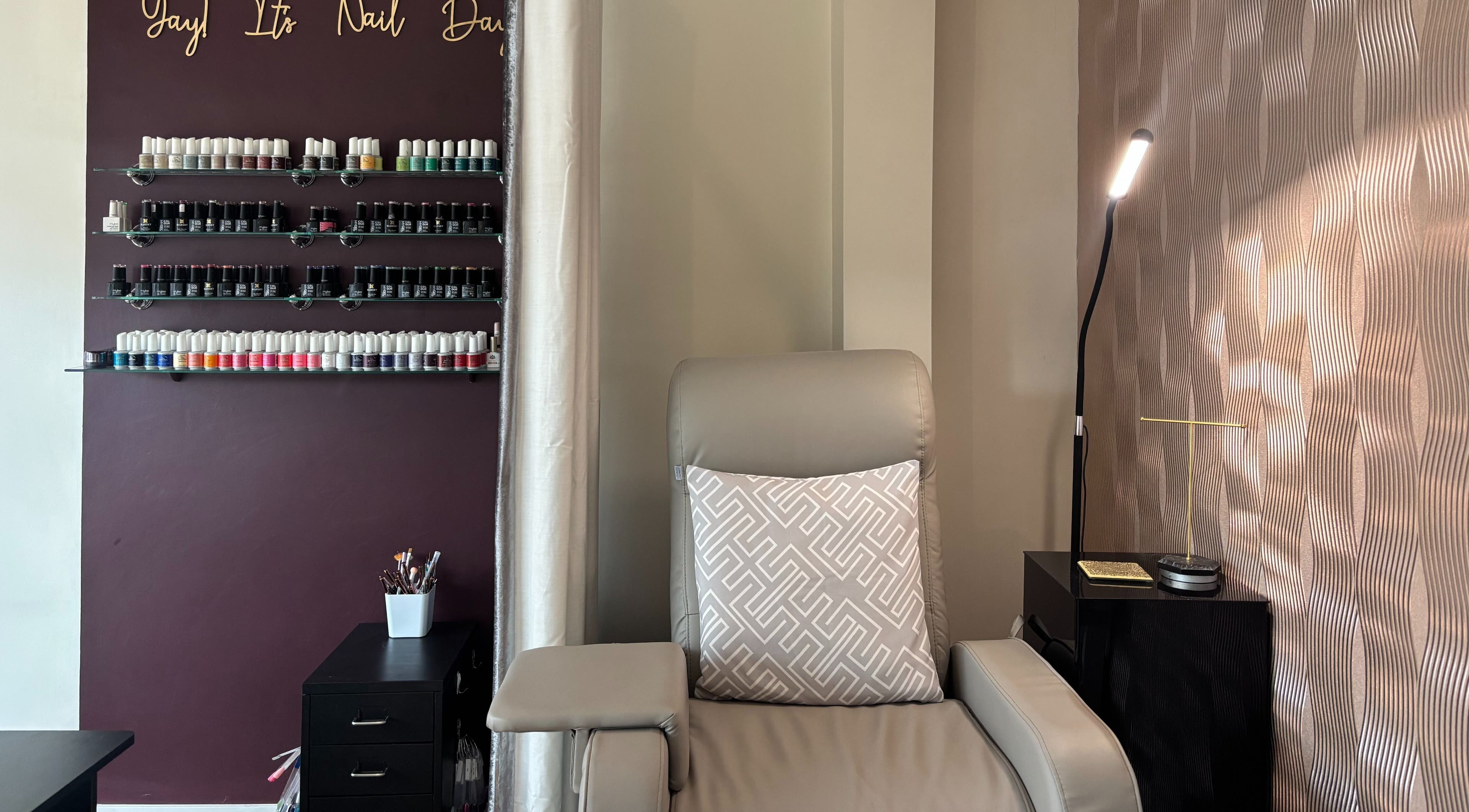 Luxurious nail lounge at Beauty Within, Gosport, England. Elegant design with vibrant polish collection.