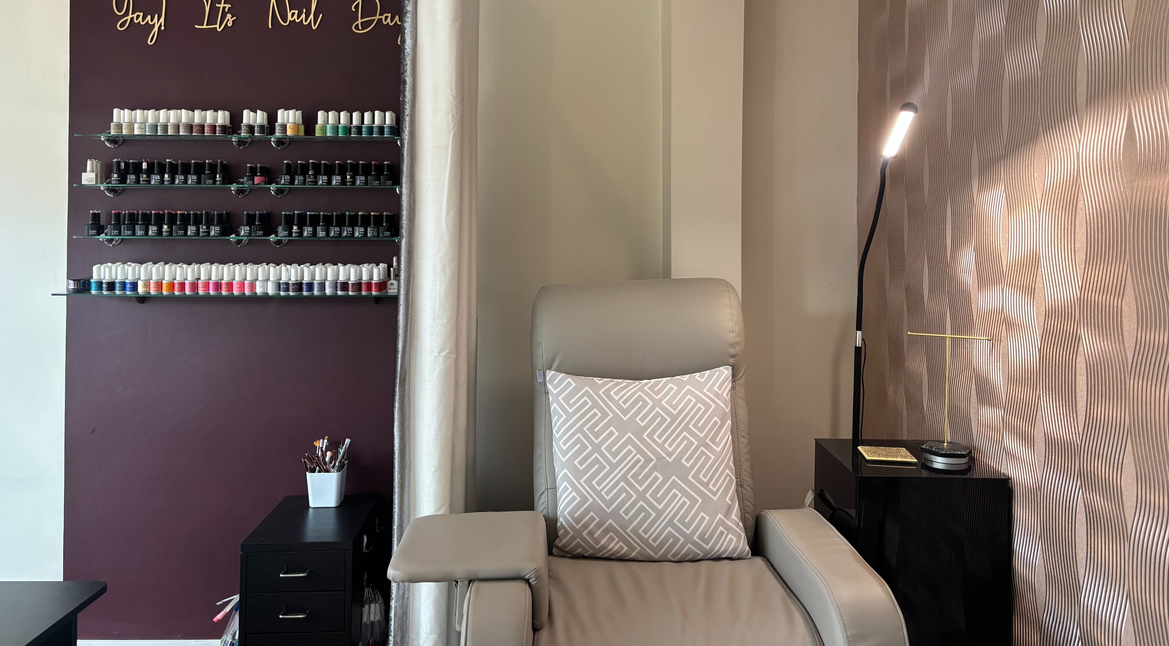 Luxurious nail lounge at Beauty Within, Gosport, England. Elegant design with vibrant polish collection.