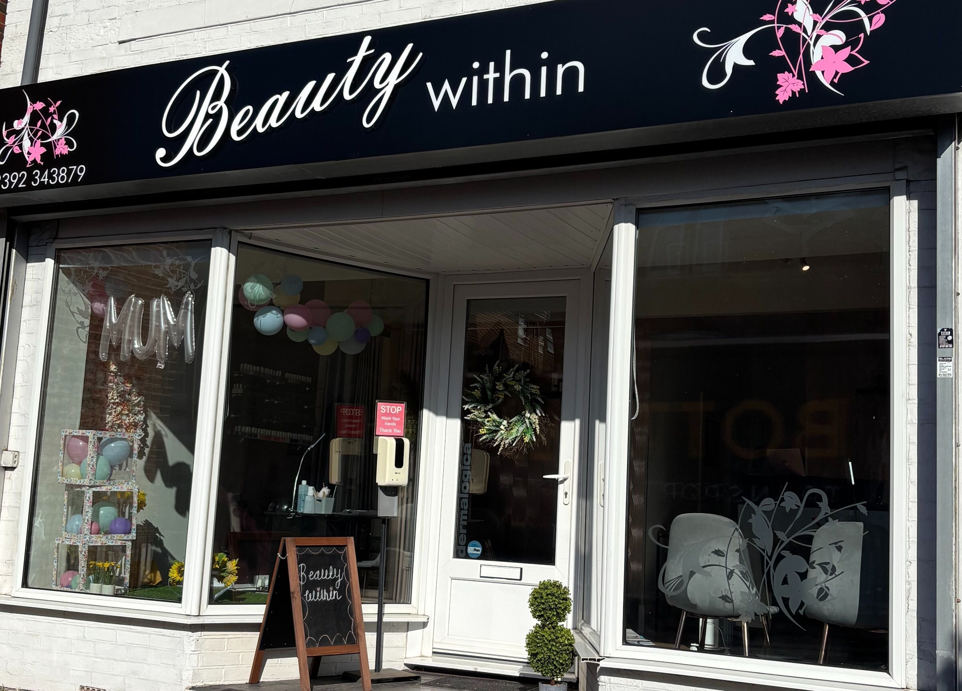 Exterior of Beauty Within, a beauty venue in Gosport, England, GB with elegant signage and floral decor.