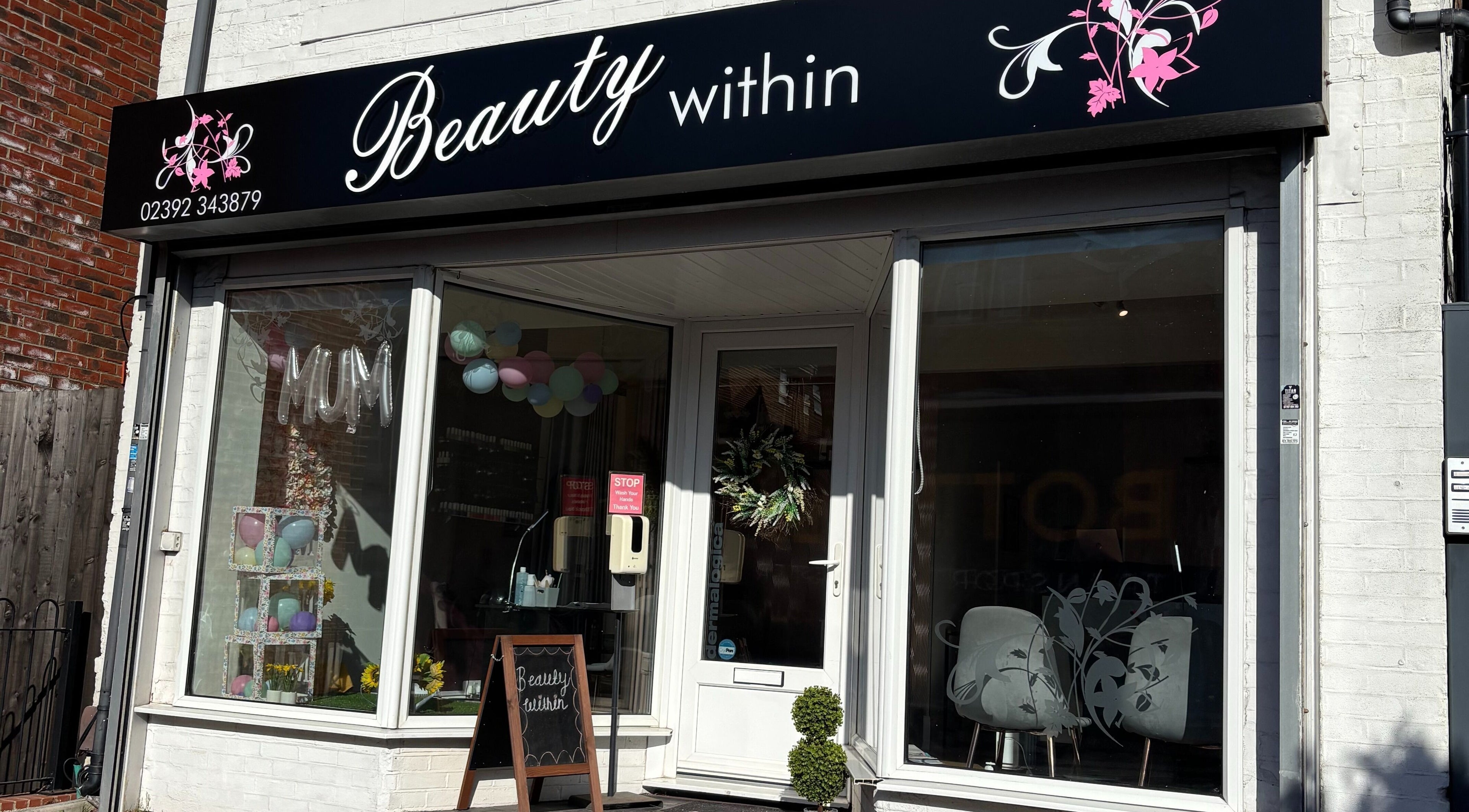 Exterior of Beauty Within, a beauty venue in Gosport, England, GB with elegant signage and floral decor.