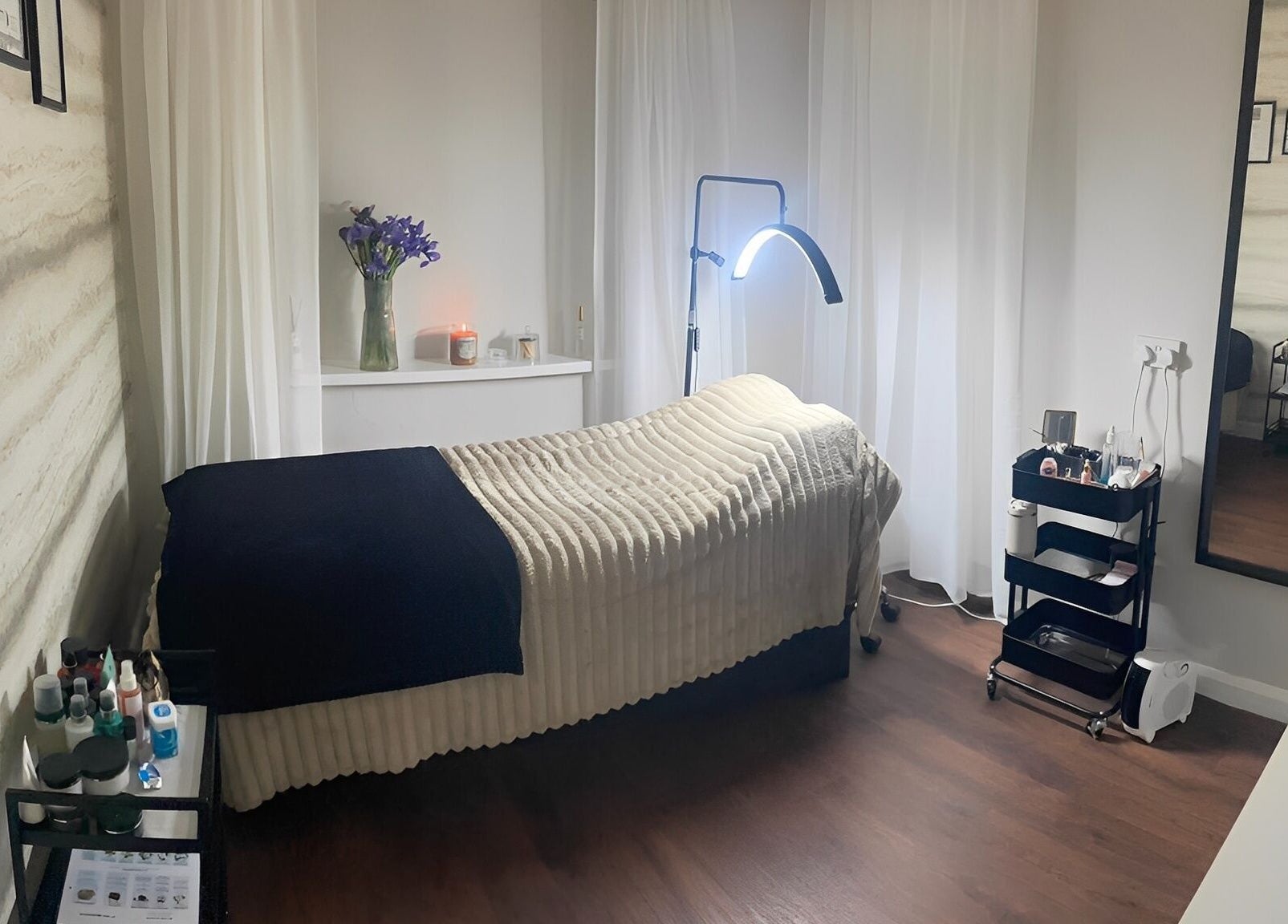 Tranquil treatment room at NR Beauty Lounge, Birtley, England, GB featuring a massage bed with cozy decor.