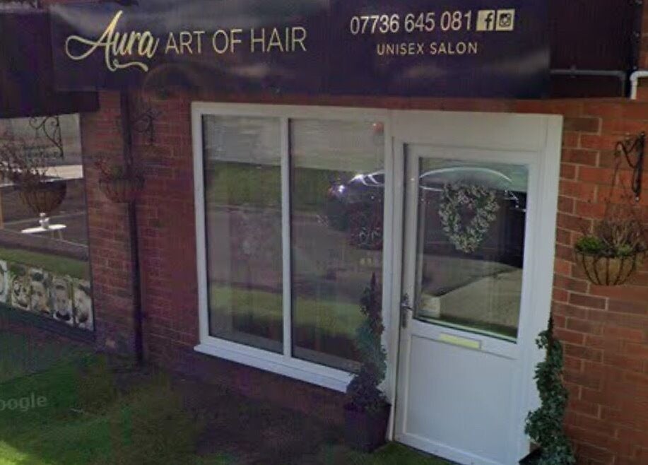 Exterior view of NR Beauty Lounge, a modern salon in Birtley, England, GB, showcasing a stylish entrance.