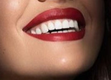 Close-up of a radiant smile with red lips at ANGEL LASH, Beaconsfield, Western Australia, AU.