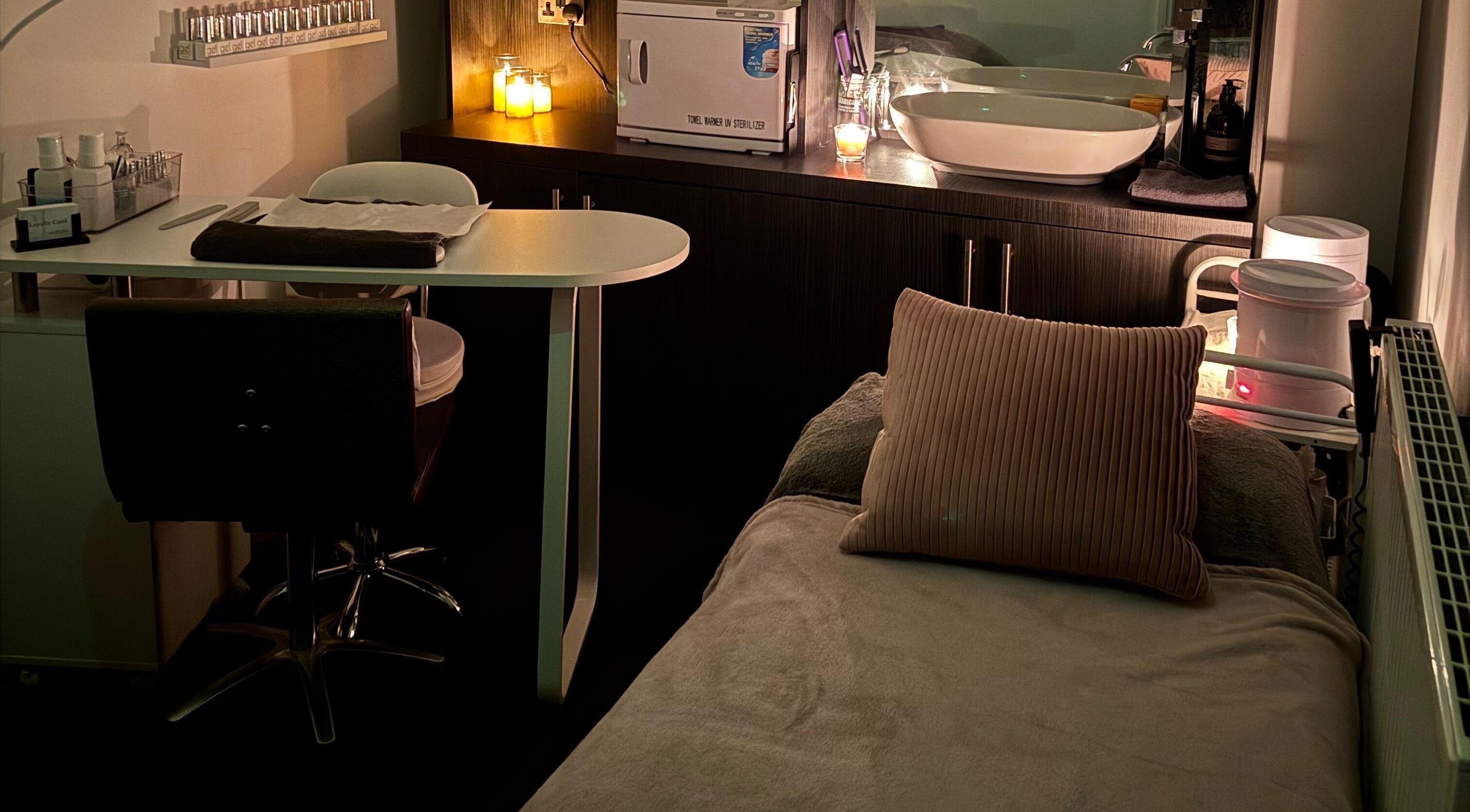 Cozy treatment room at Emily Jane Beauty in Harrogate, England, GB with soft lighting and elegant decor.