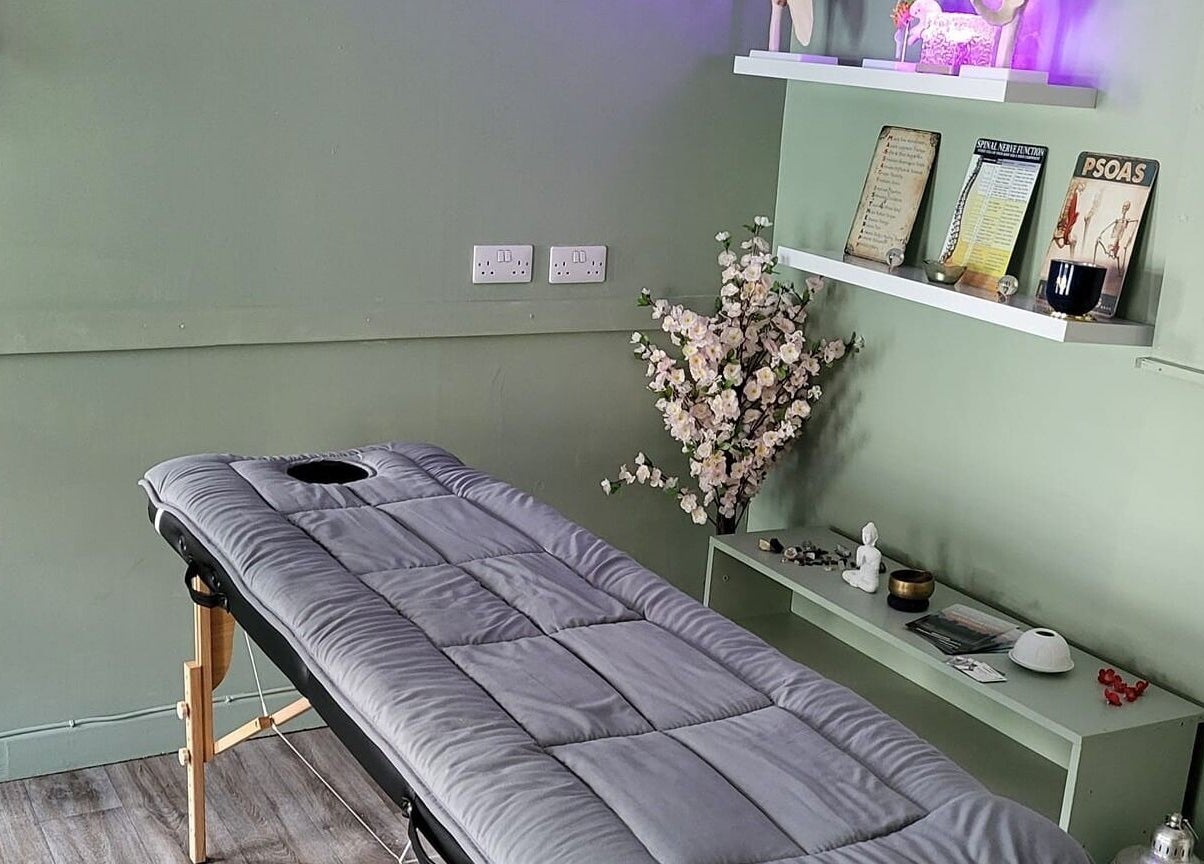 Serene massage room at Macroom Massage and Holistic Clinic, County Cork, IE, featuring a comfortable massage table.