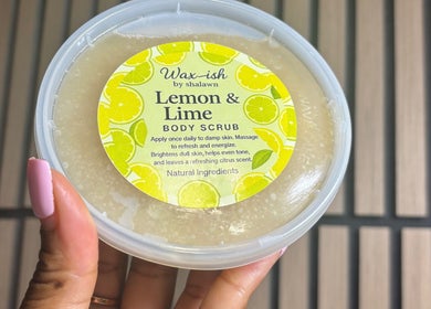 Lemon & Lime Body Scrub by Waxish by Shalawn, Arouca, Tunapuna/Piarco, TT, in a hand-held container.