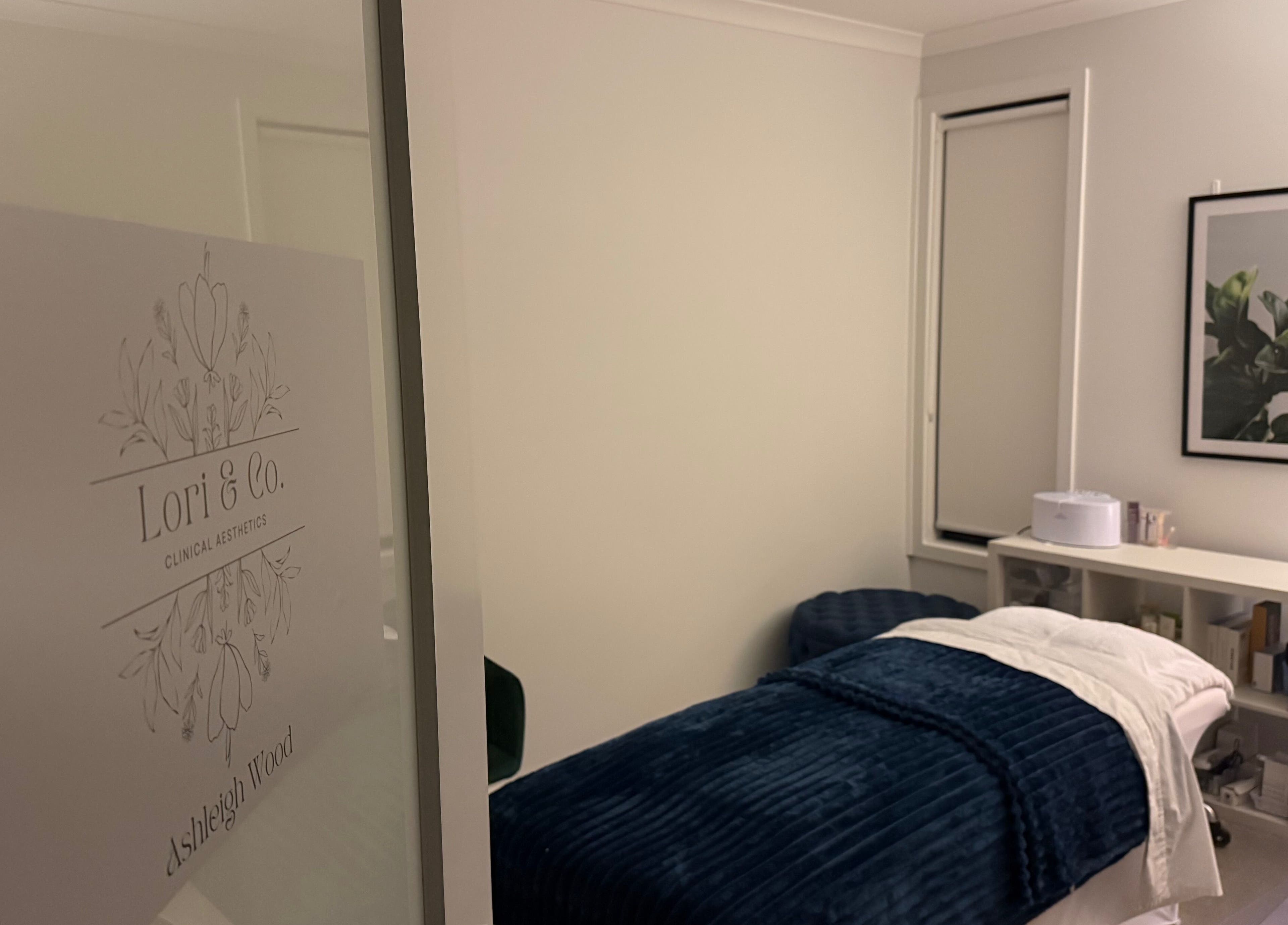 Serene treatment room at Lori & Co. Clinical Aesthetics, Melbourne, Victoria, AU featuring a cozy massage table.