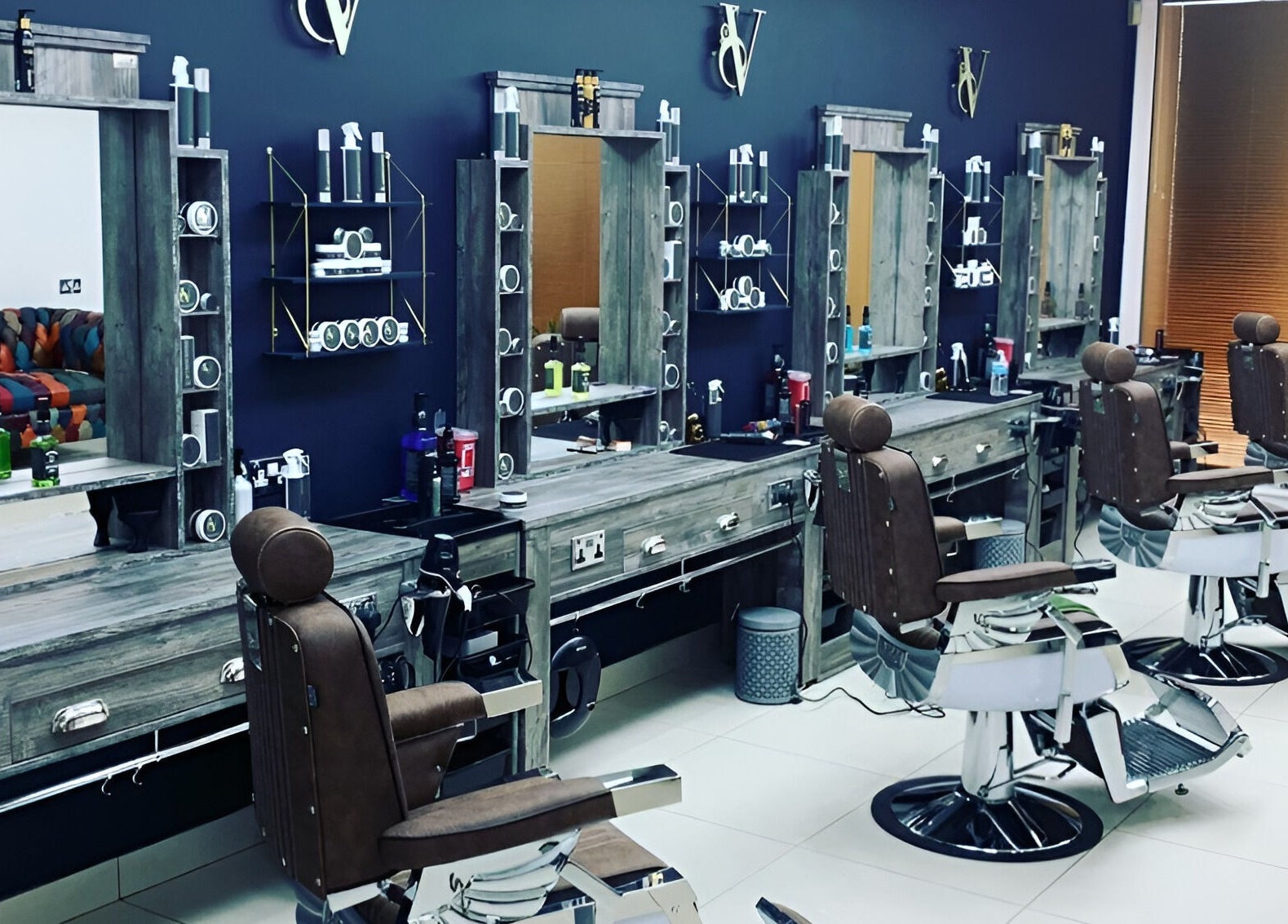 Chic barber chairs and modern stations at Le Vogue Barber, Bowdon, England, GB