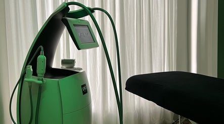 Advanced treatment machine at Saunapod in Falmouth, England, GB; modern wellness technology.