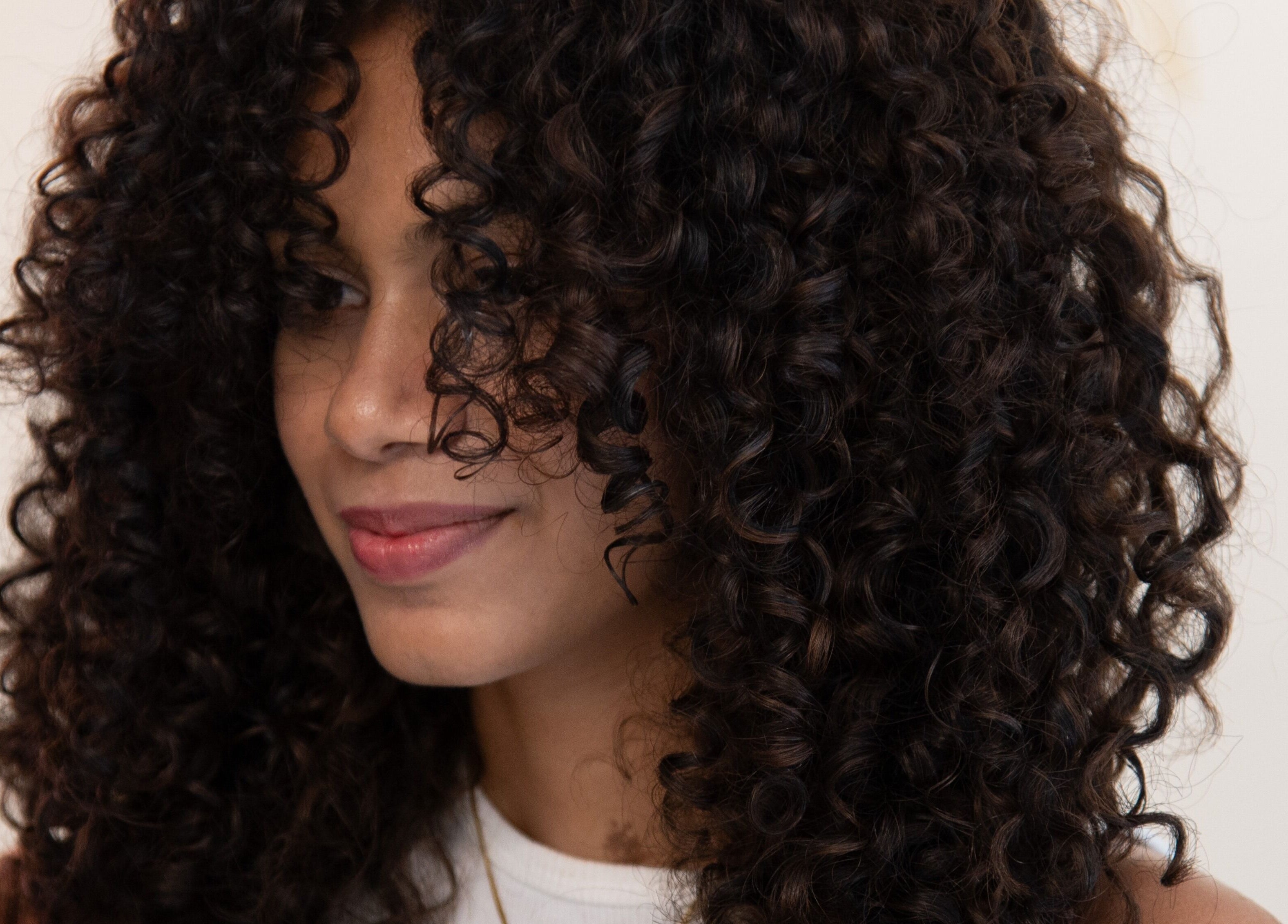 Stylish curly hairstyle at Alchemic Beauty Studio Chennai, located in Chennai, Tamil Nadu, IN.