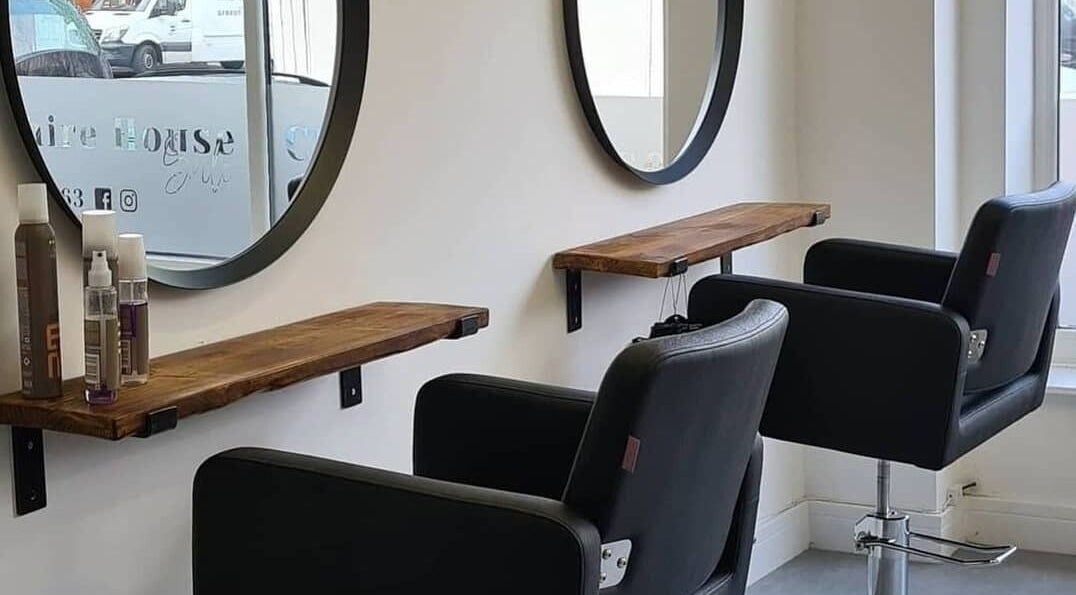 Cheshire House Sale salon interior with chic chairs and mirrors in Sale, England, GB.