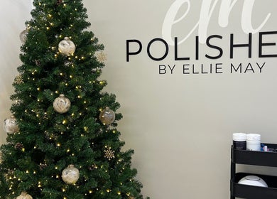 Christmas tree and decor at POLISHED BY ELLIE MAY, Clacton-on-Sea, England, GB enhancing festive ambience.