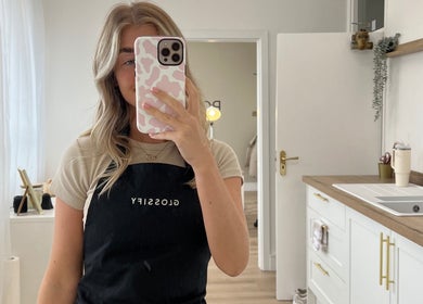 A stylist at POLISHED BY ELLIE MAY, Clacton-on-Sea, England, captures the salon's stylish interior.
