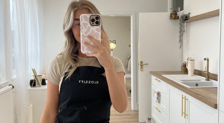 A stylist at POLISHED BY ELLIE MAY, Clacton-on-Sea, England, captures the salon's stylish interior.