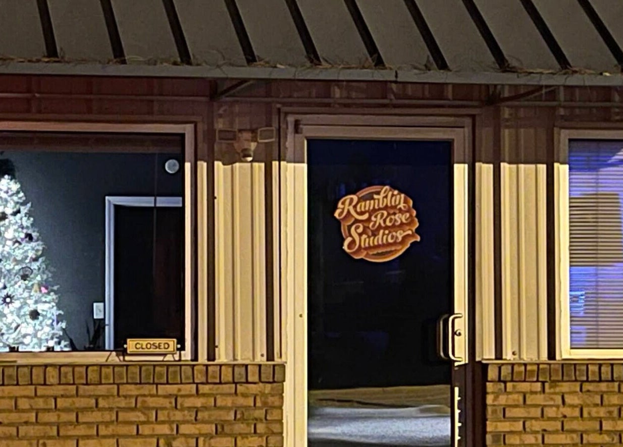 Entrance of Ramblin’ Rose Studios, featuring holiday decor, Anderson, South Carolina, US.