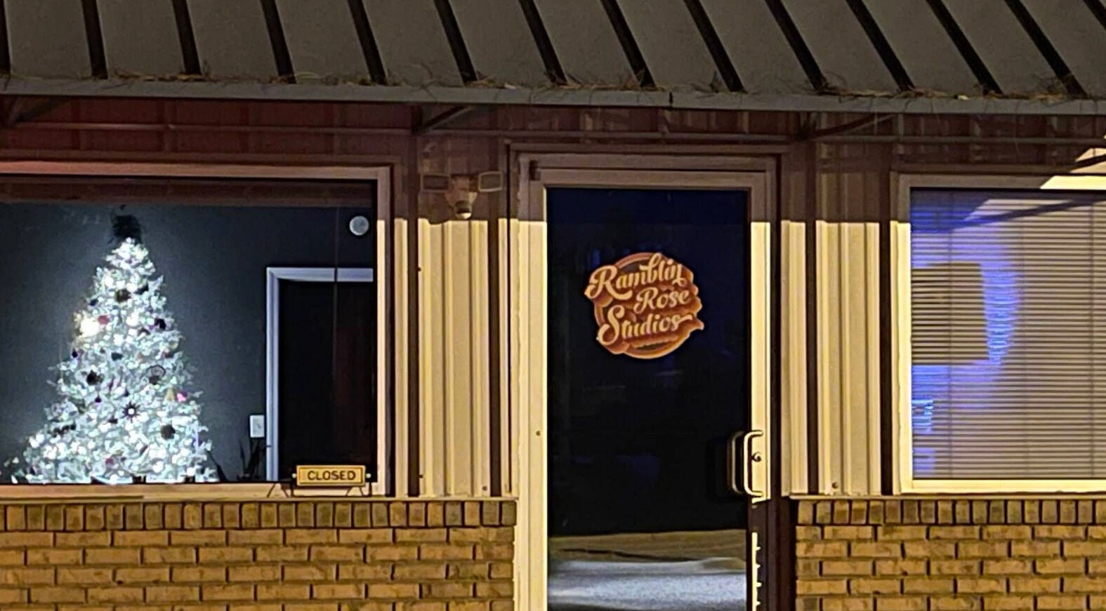 Entrance of Ramblin’ Rose Studios, featuring holiday decor, Anderson, South Carolina, US.