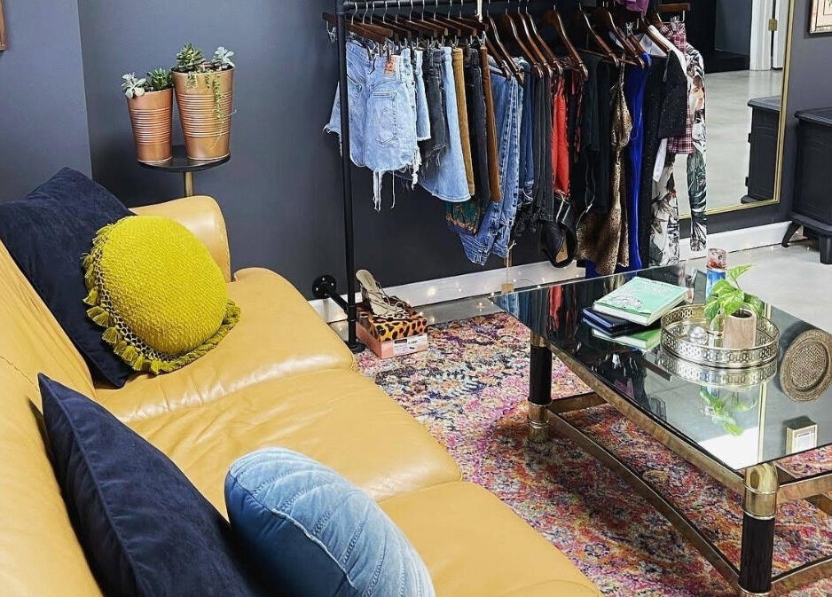 Cozy lounge area at Ramblin’ Rose Studios, Anderson, South Carolina, US, featuring chic decor and vibrant seating.