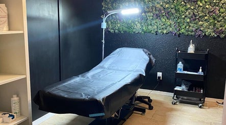 Calming treatment room at MicroMeeks Skin Studio, Port Coquitlam, British Columbia, CA with spa bed and ambient light.