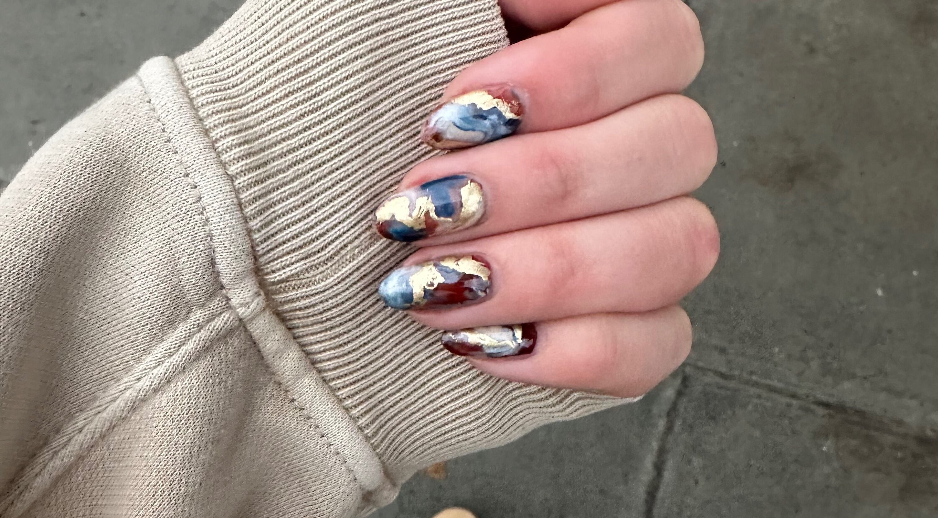 Elegant marble nail art design showcased at Thrive Studio, London, England, GB.