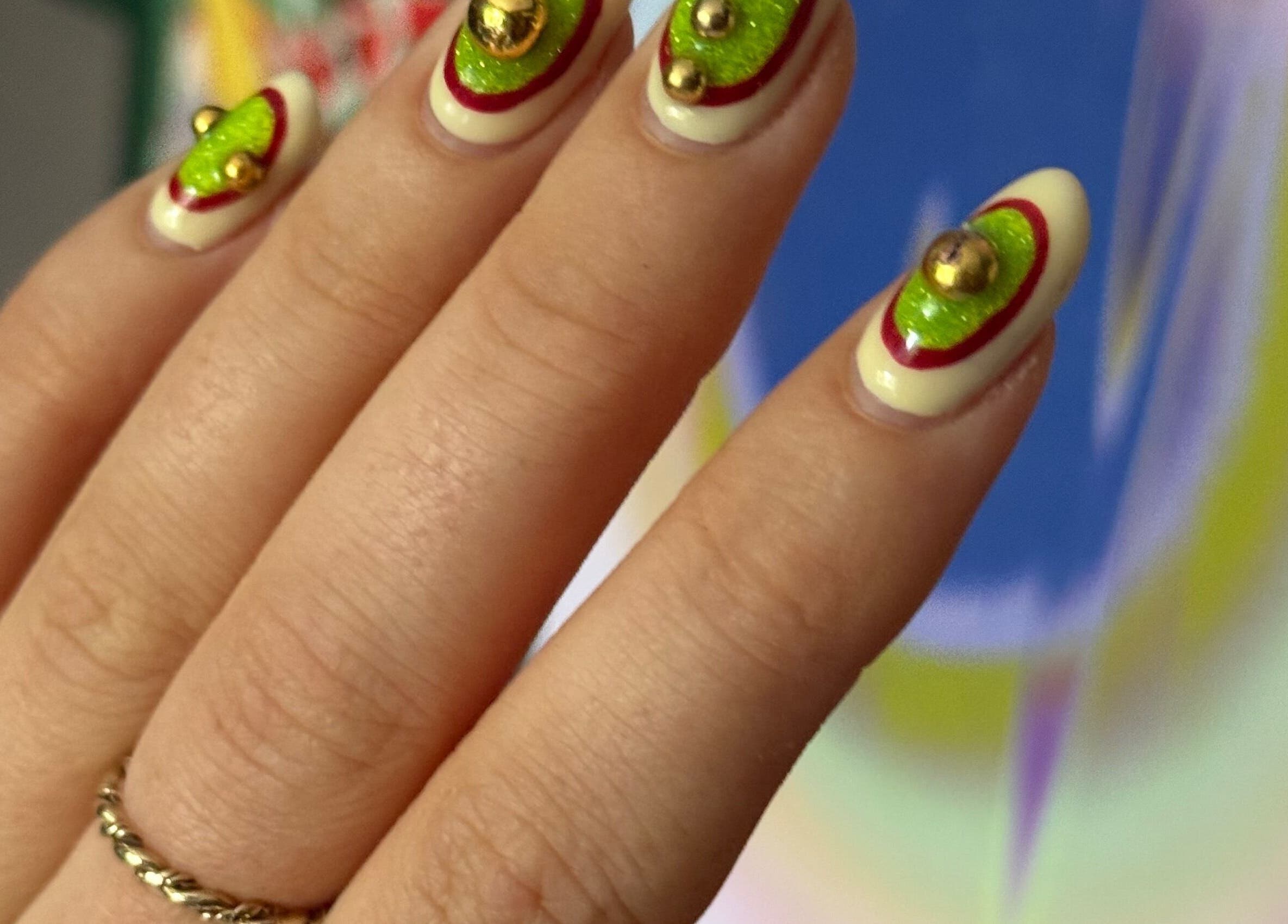 Vibrant nail art design at Thrive Studio, London, England, GB, showcasing bold colors and unique textures.