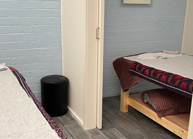 Two massage tables in a tranquil room at Paradai Thai Massage & Bodycare (Elsternwick), Melbourne, Victoria, AU.