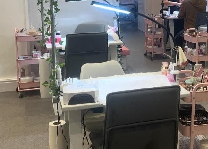 Elysium Beauty Limited nail station with tools in Castletown, GB, offering luxurious beauty treatments.