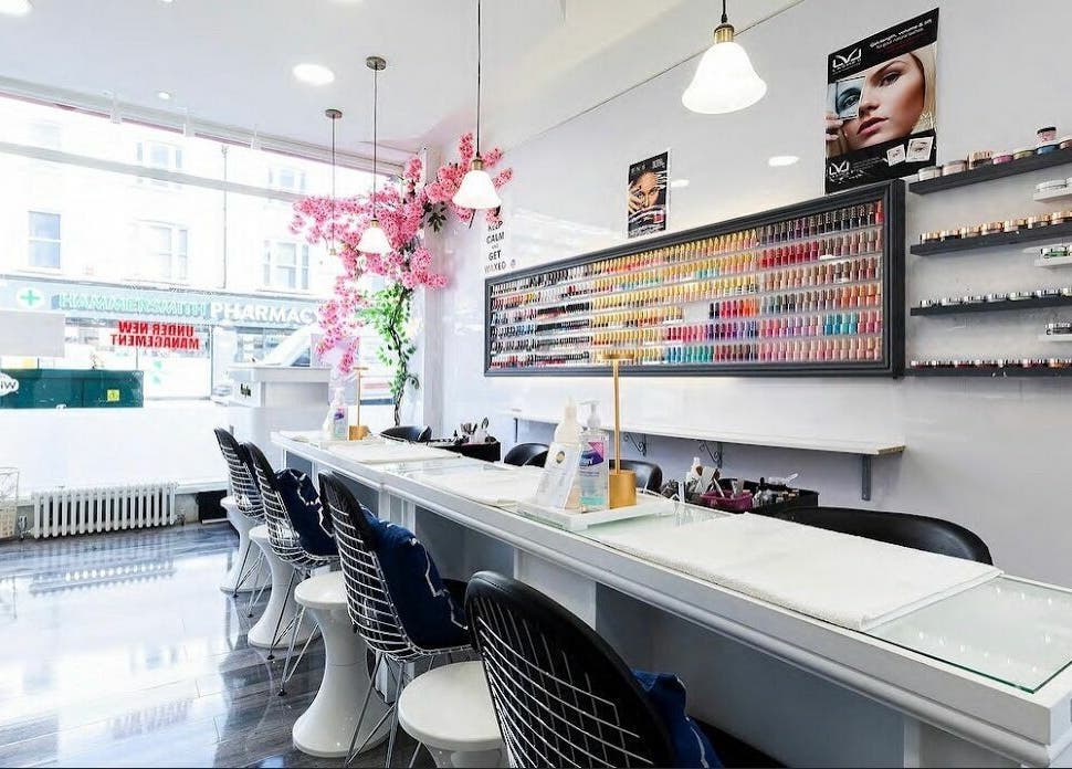 Princess Nails and Beauty salon interior showcasing vibrant polish selection in London, England, GB.