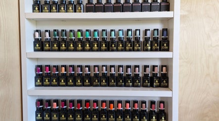 Elegant nail polish display at Nails by Kelly, Waipu, Northland, NZ featuring a range of vibrant colors.