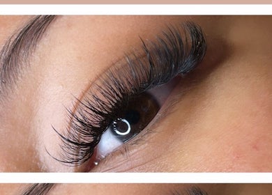 Close-up of expertly applied eyelash extensions at Veiled Beauty Bar, Woodridge, Queensland, AU.