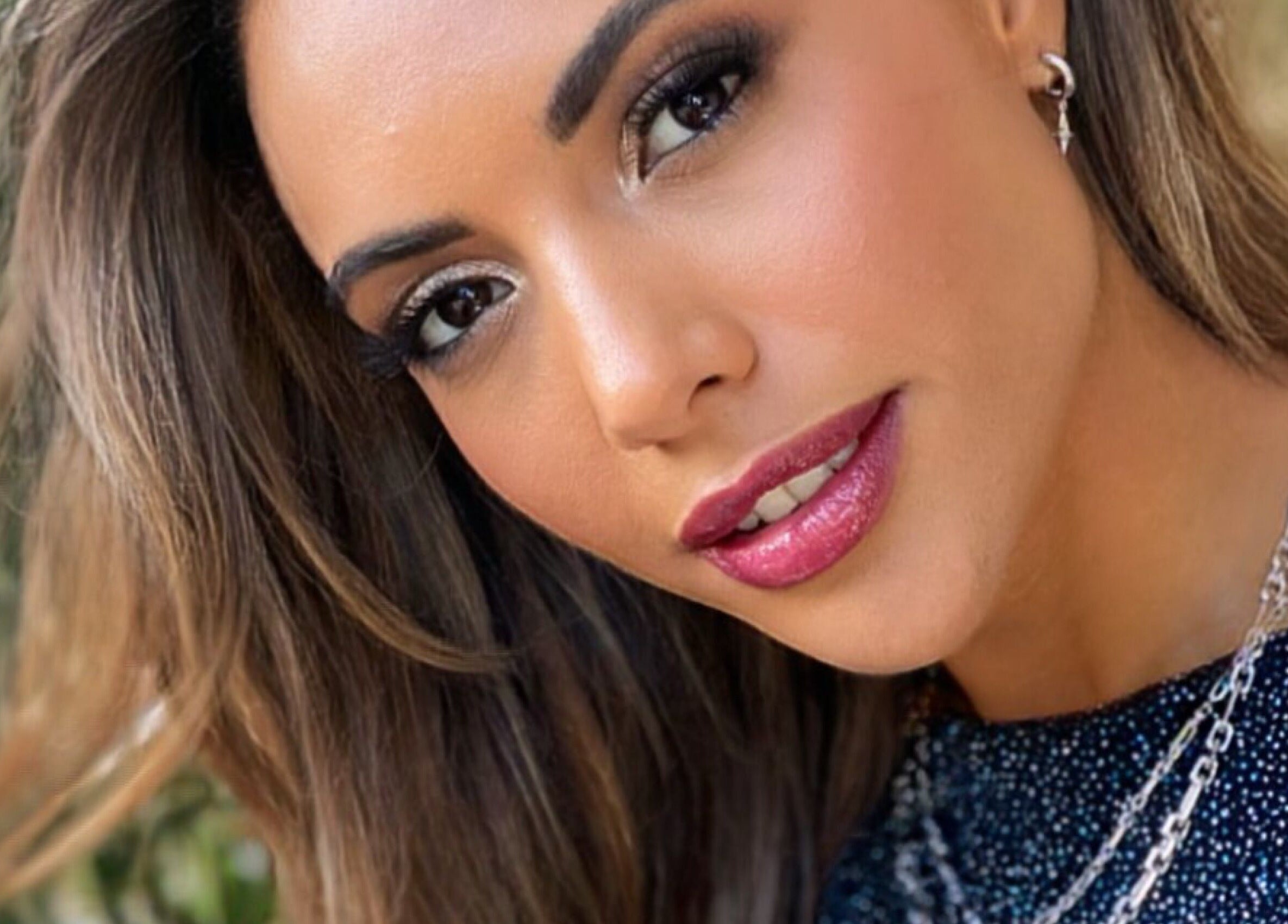 Close-up of elegant makeup by Chloe Bond MUA in Barnstaple, England, GB, highlighting vibrant lipstick.