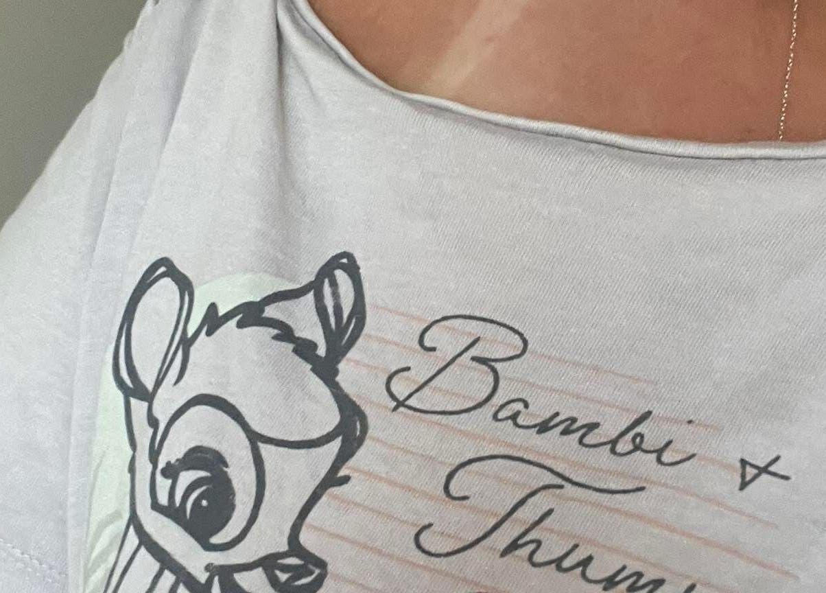 Cartoon-themed shirt at Spray&Glow Leeds, Leeds, England, GB, showcasing relaxed style.