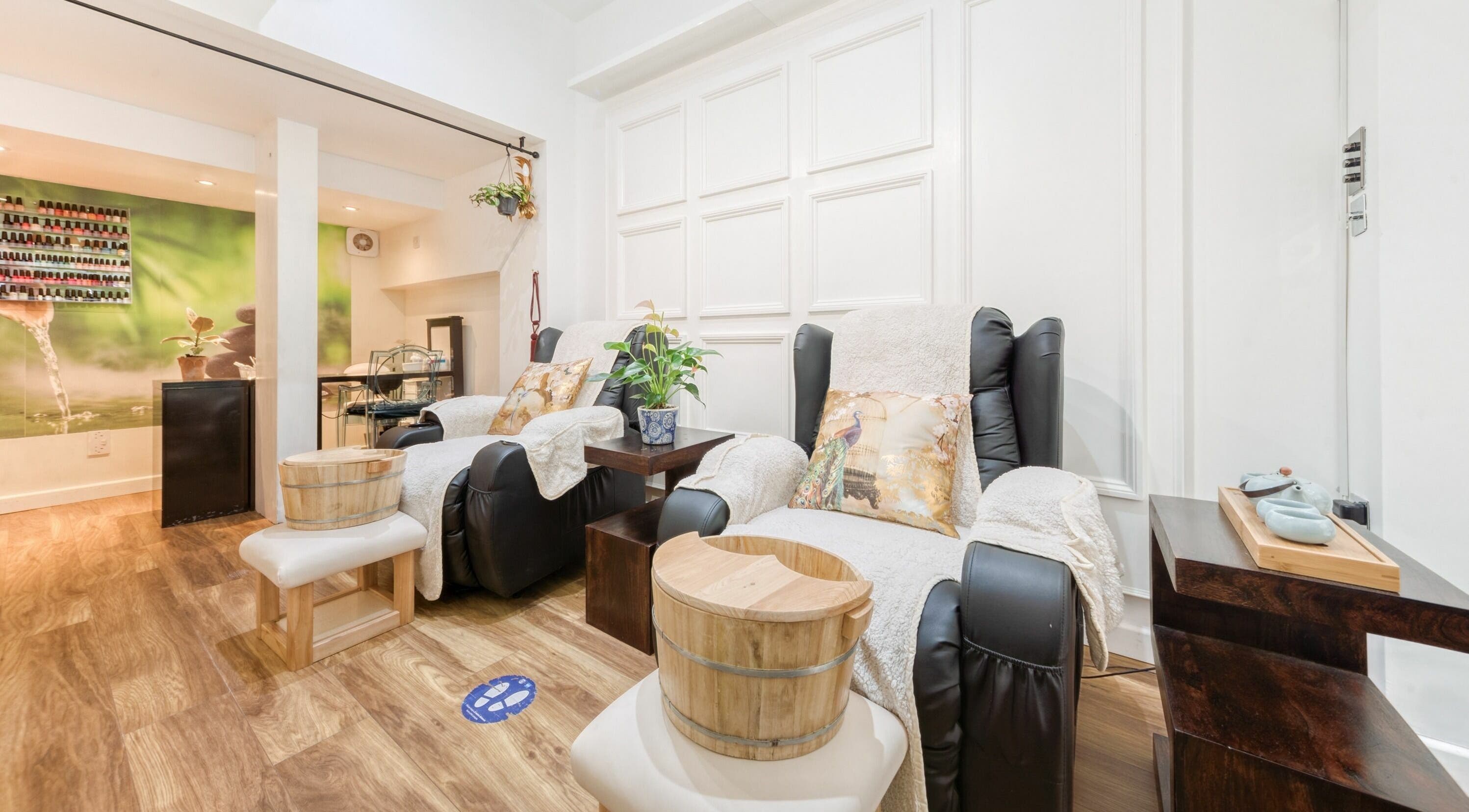 Relaxing spa chairs at JJ Natural Beauty And Massage, London, England, GB with soft lighting and decor.