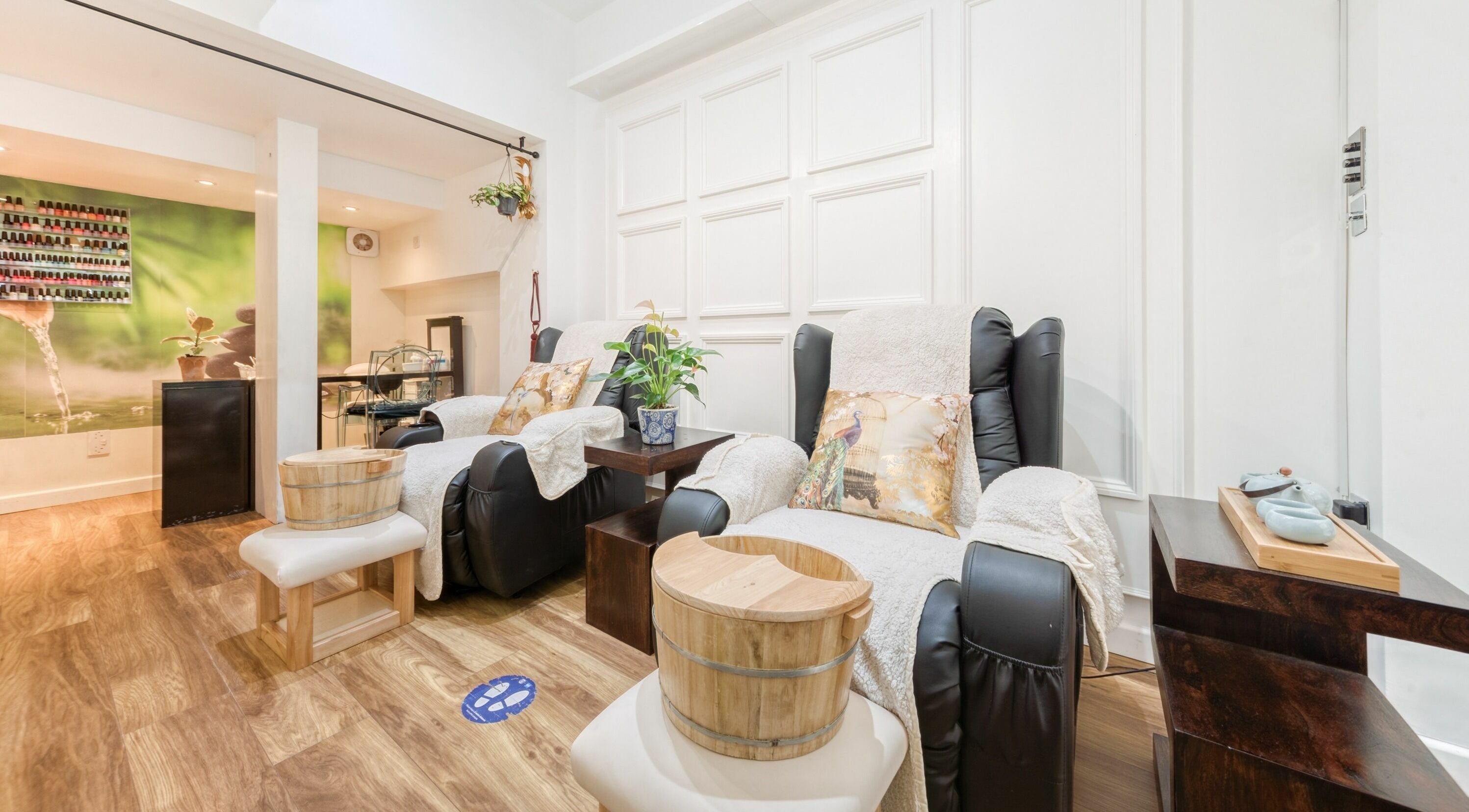 Relaxing spa chairs at JJ Natural Beauty And Massage, London, England, GB with soft lighting and decor.