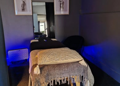 Cozy massage room at Body Shop Studio For Men, Cape Town, ZA with a relaxing ambiance.