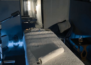 Massage room at Body Shop Studio For Men in Cape Town, ZA, featuring a serene setup with a massage table.